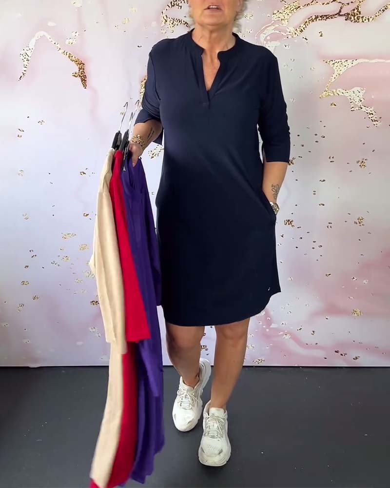 Elegant women's V-neck midi dress, perfect for versatile style, comfort, and a flattering silhouette.