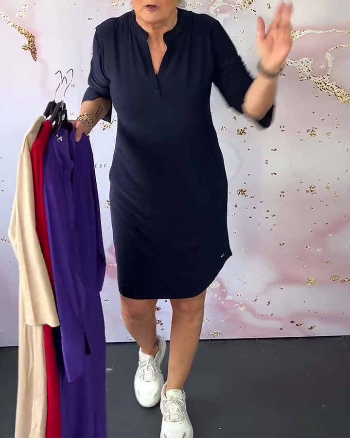 Flattering V-neck midi dress for women, offering an elegant & comfortable fit for any event.