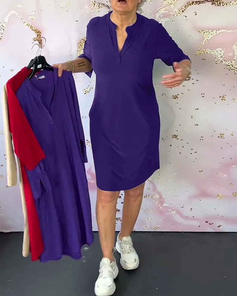 Classic V-neck midi dress for women, offering elegant style & comfortable fit for any occasion.