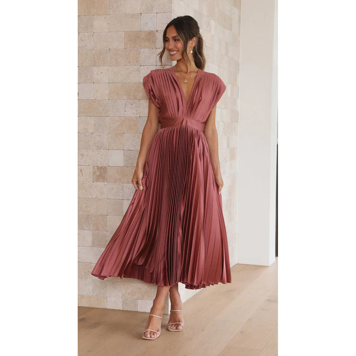 Women's V-neck midi dress, featuring an elegant design and a flowing pleated skirt, perfect for any occasion.