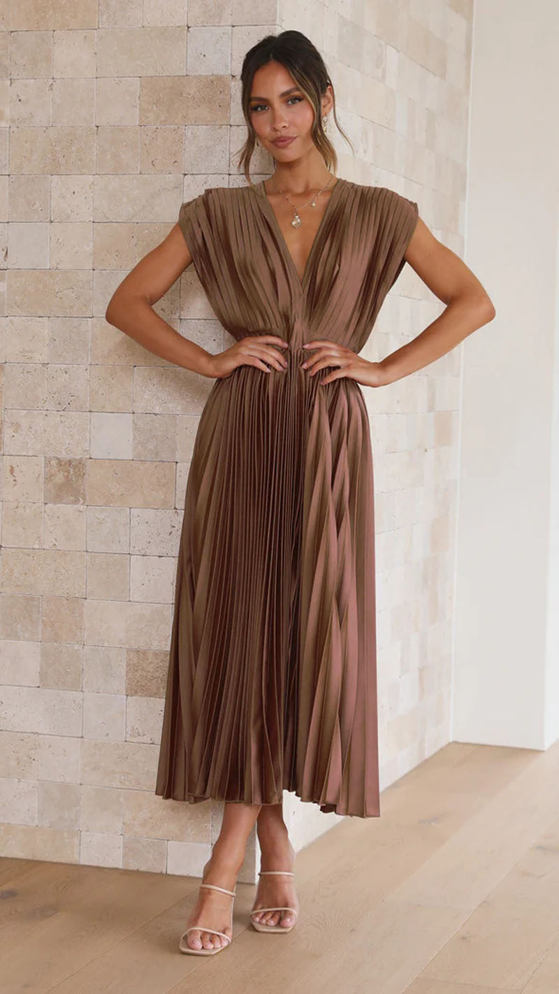 Beautiful women's elegant V-neck midi dress with a flowing pleated skirt, ideal for spring and summer events.