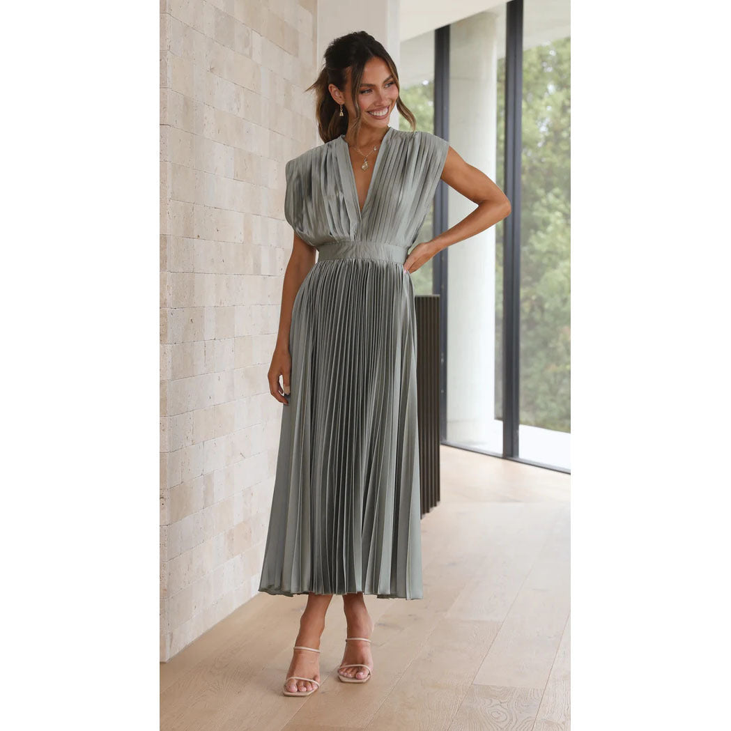 Fashionable women's V-neck midi dress, featuring an elegant design and a flowing pleated skirt for style.