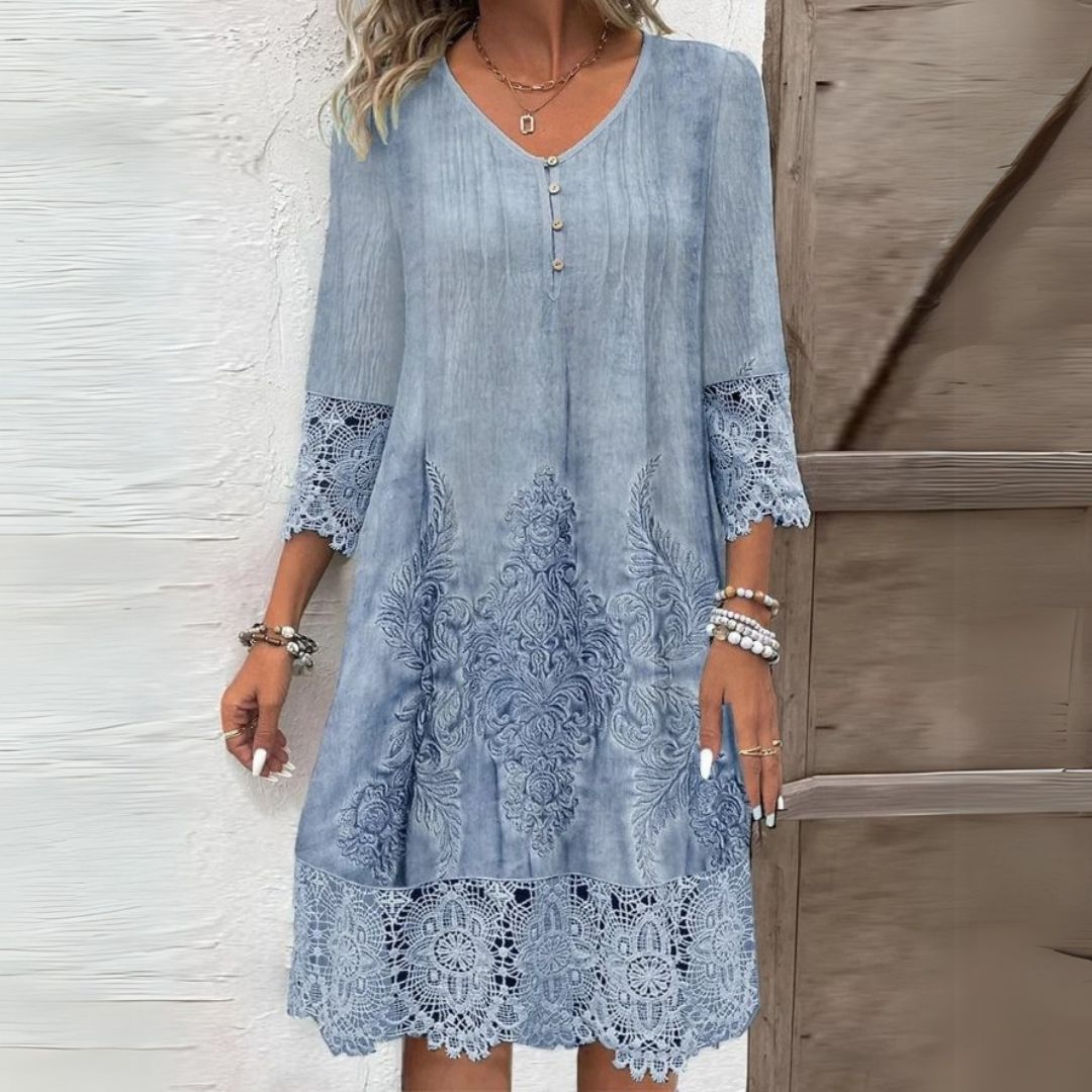 Elegant women's V-neck midi dress with intricate embroidery and lace trim, perfect for spring/summer style.