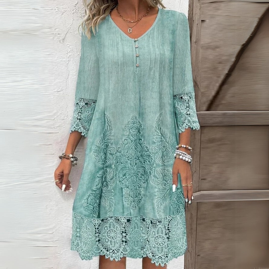 Stylish women's V-neck embroidered midi dress with three-quarter sleeves & relaxed fit for effortless spring casual.
