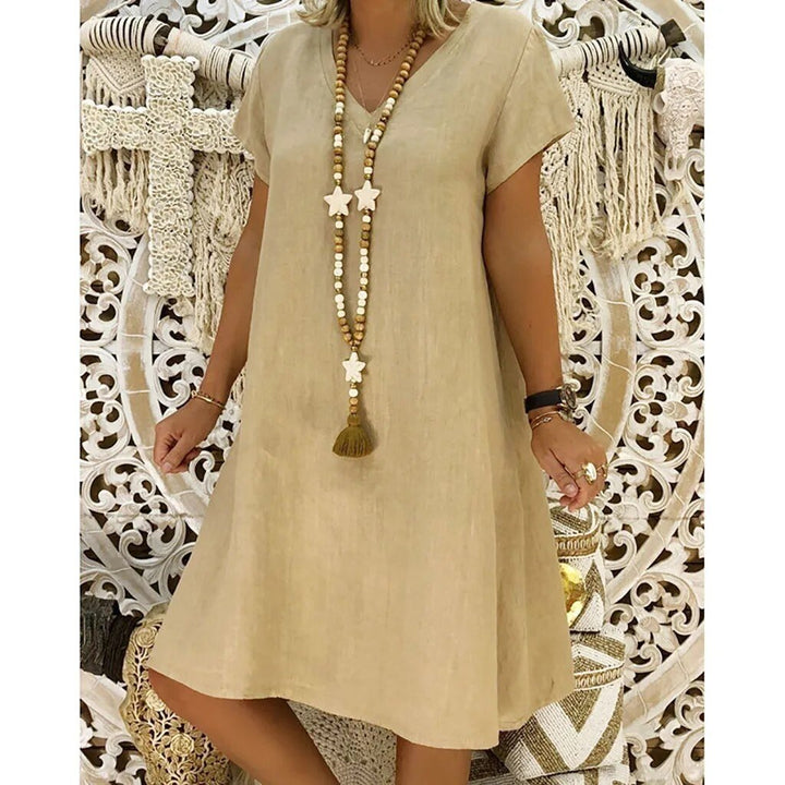 Women's stylish V-neck mini dress, ideal for evening parties or a comfortable summer house dress.