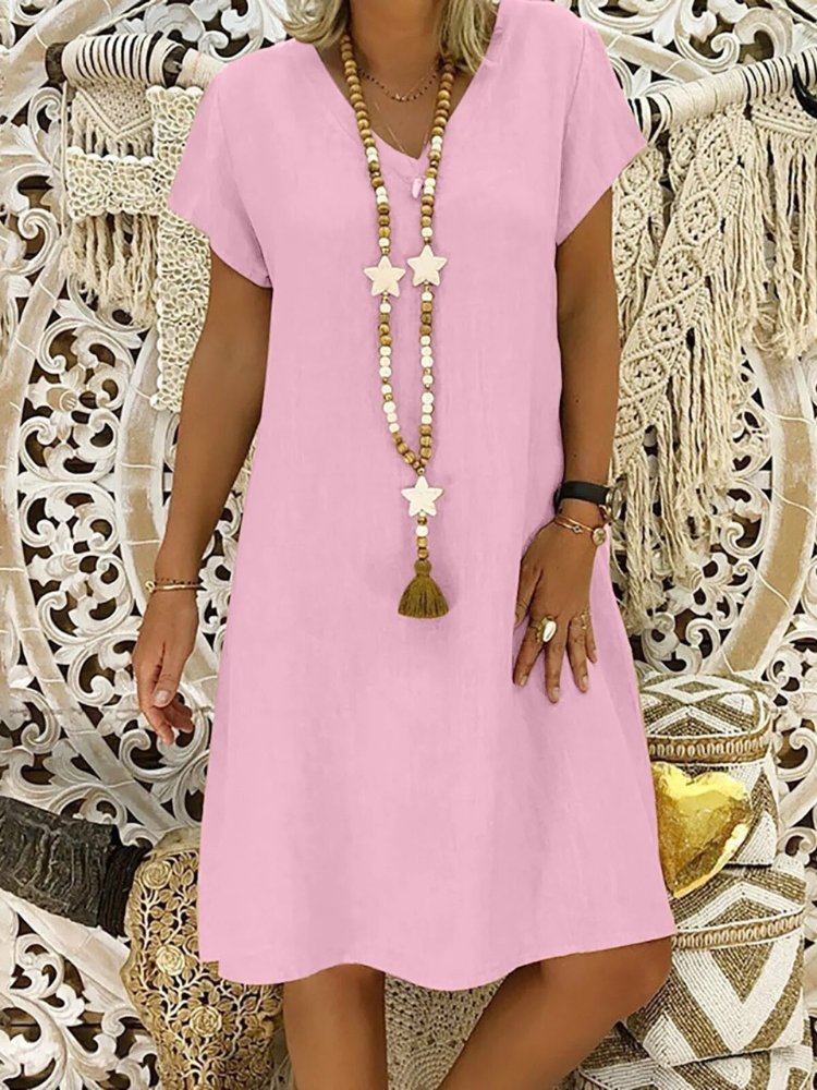Chic women's V-neck mini dress. Perfect as an elegant evening outfit or a relaxed summer house dress.