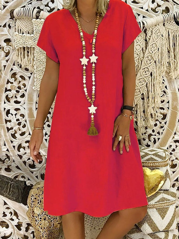 Lightweight women's V-neck mini dress, ideal for elegant evening parties or a relaxed summer house dress.