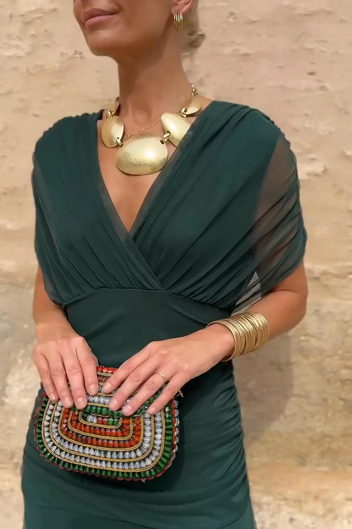 Women's elegant flowy maxi dress, V-neck design for special occasion parties & evening wear.