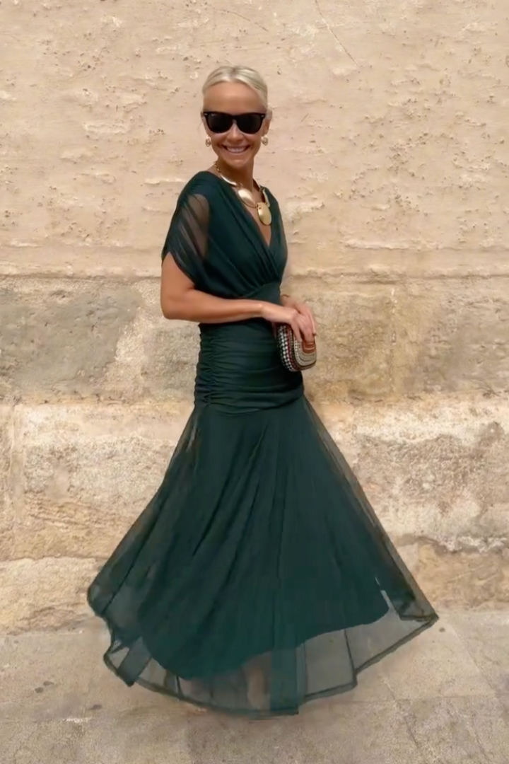Vibrant colorful gradient V-neck maxi dress for women, perfect for elegant special occasion parties.