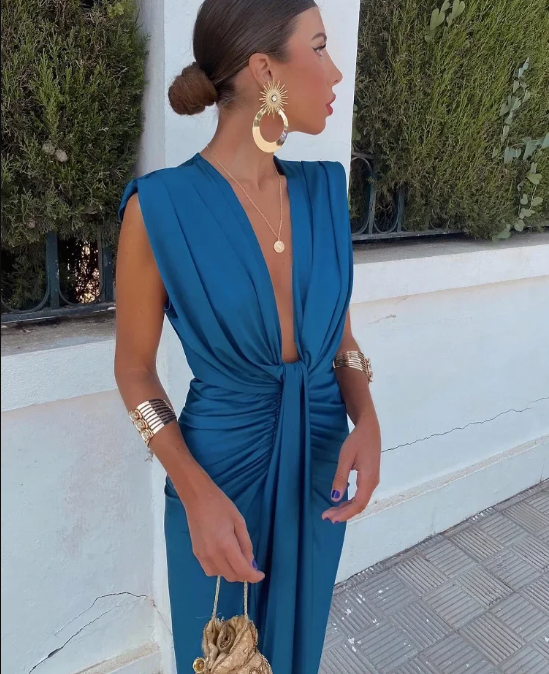 Elegant women's V-neck pleated midi dress, perfect occasion wear for wedding guests. Formal & flattering.