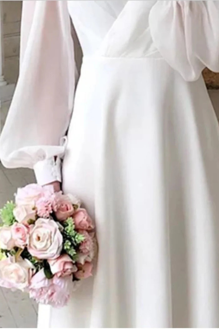 Stylish women's V-neck puff sleeve midi dress, a modern formal choice for wedding guests & special occasions.