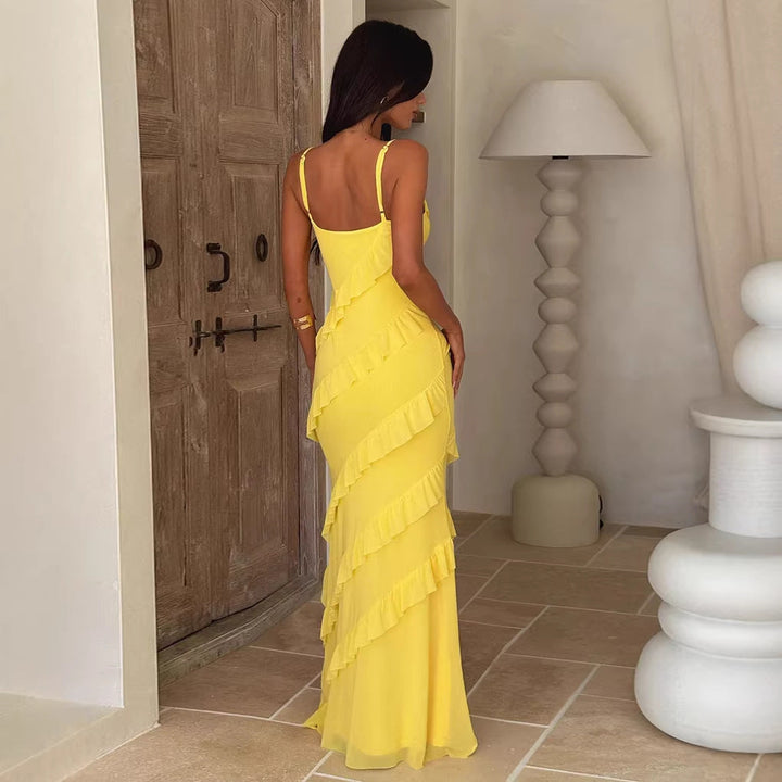 Sleeveless elegant maxi dress with V-neck ruffles, ideal as a women's wedding guest or special occasion gown.