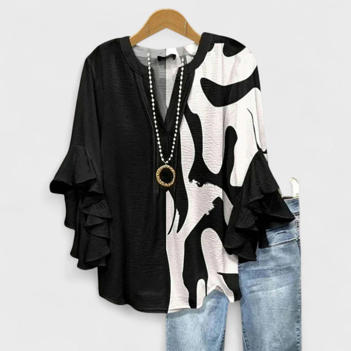 Versatile women's V-neck top with fashionable ruffle sleeves, great for spring, summer, and work.