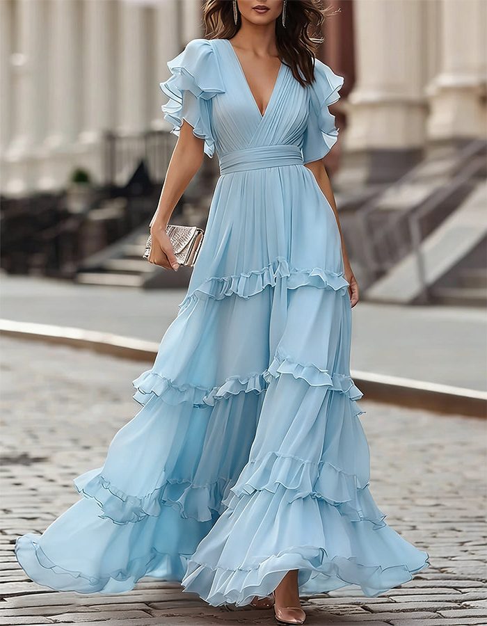 Graceful pink V-neck maxi dress with delicate ruffles & flutter sleeves. An elegant long dress for wedding guests.