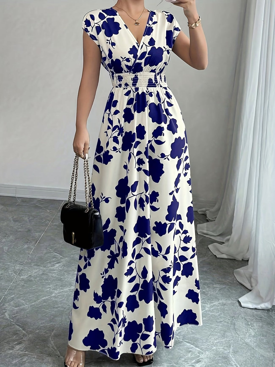 Versatile women's elegant V-neck sleeveless dress. Easily transitions from daydress to eveningwear.