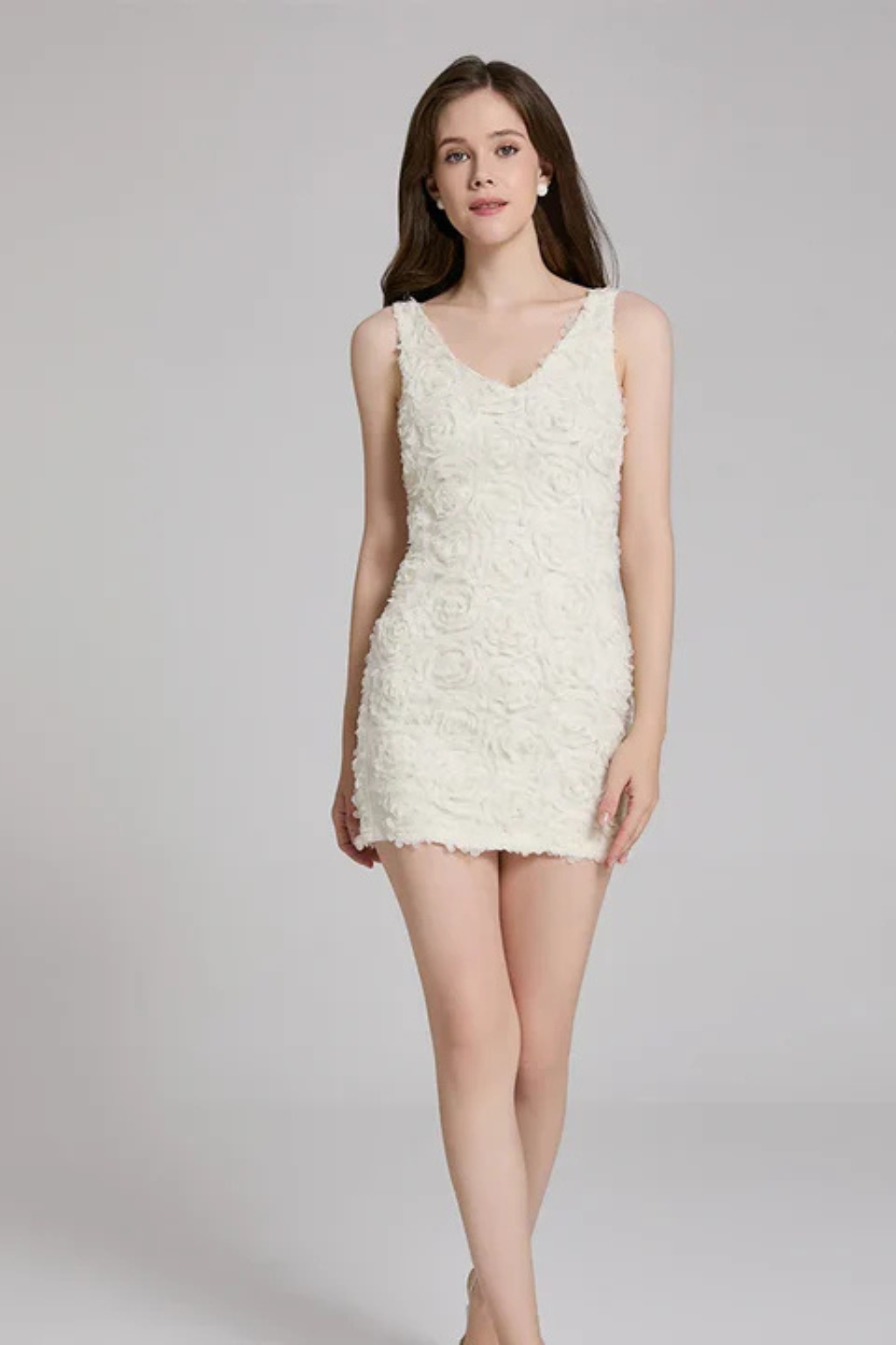 Chic women's floral textured V-neck sleeveless fitted party dress, ideal as a cocktail or formal guest dress.