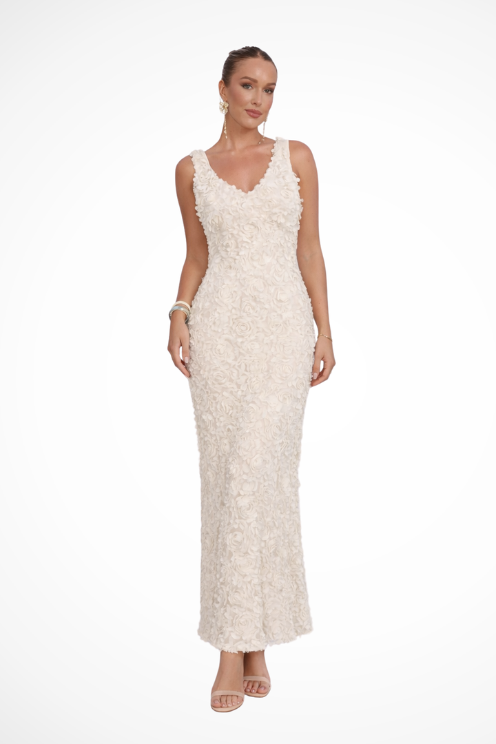 Fitted V-neck sleeveless floral textured dress for women, an elegant choice for wedding guests & special events.
