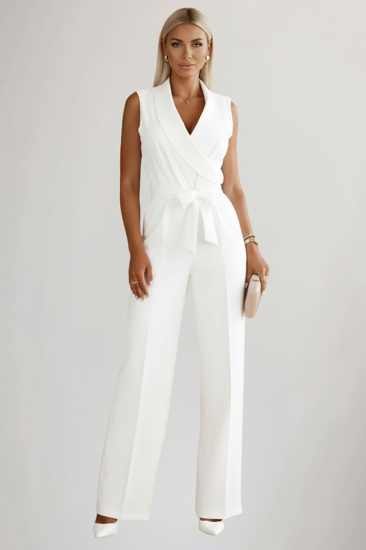 Stylish beige women's V-neck sleeveless jumpsuit. Tie-waist, wide-leg cut. Ideal elegant summer casual wear.