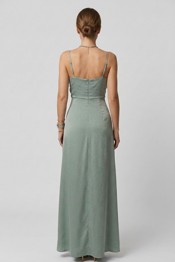 Chic sleeveless V-neck maxi dress for women, featuring a high slit, ideal for parties, formal events & fashion.