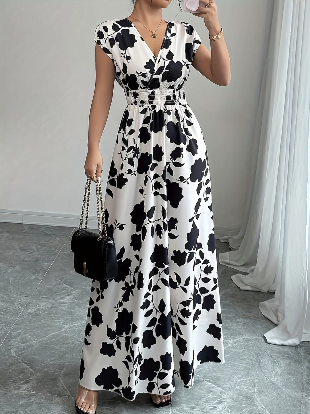 Sophisticated women's V-neck sleeveless dress with elegant midi length, ideal for summer & parties.