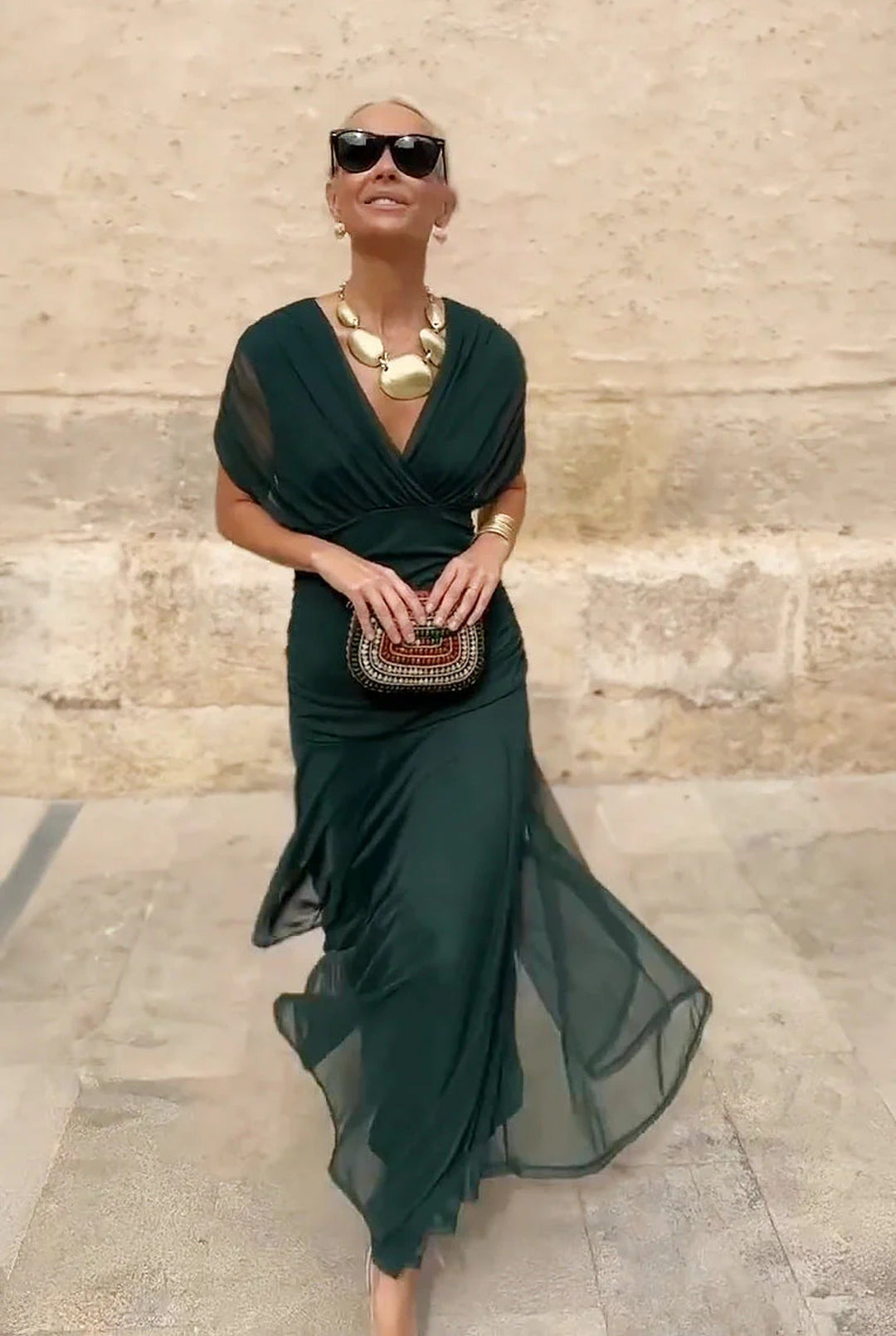 Sophisticated women's wrap maxi dress featuring a flattering V-neck, ideal for evening wear & parties.