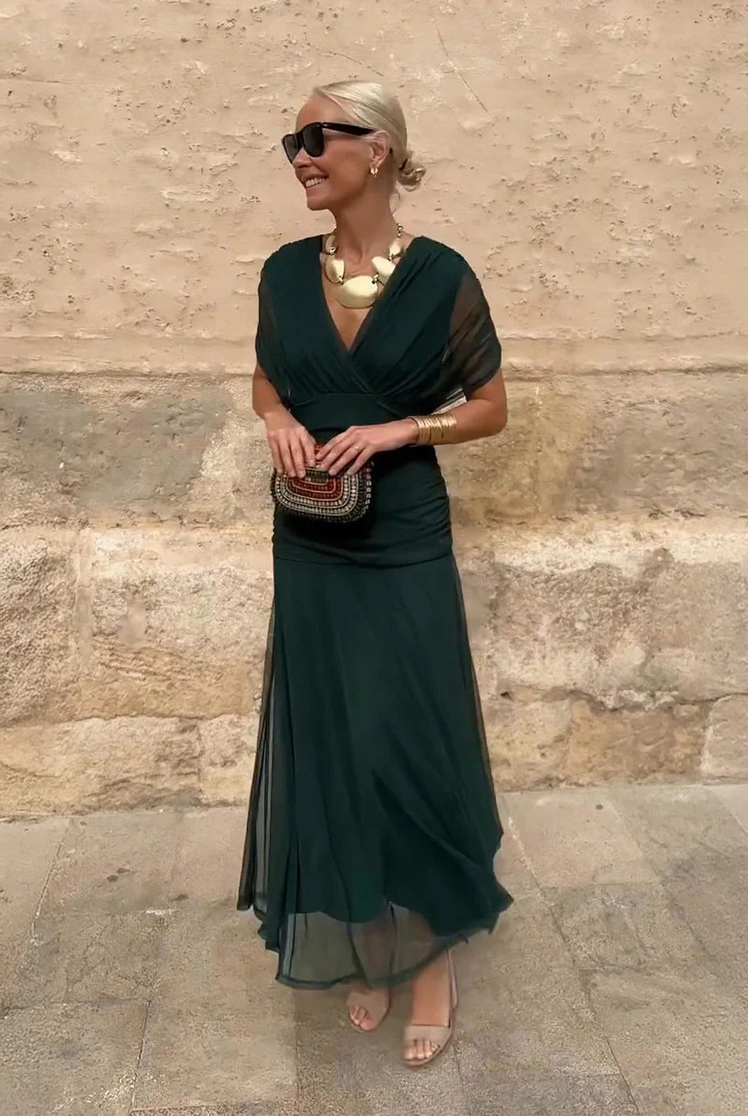 Women's elegant V-neck wrap maxi dress, a stunning formal gown for special events and parties.