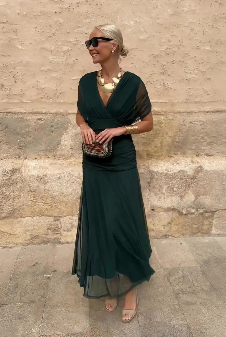 Women's elegant V-neck wrap maxi dress, a stunning formal gown for special events and parties.