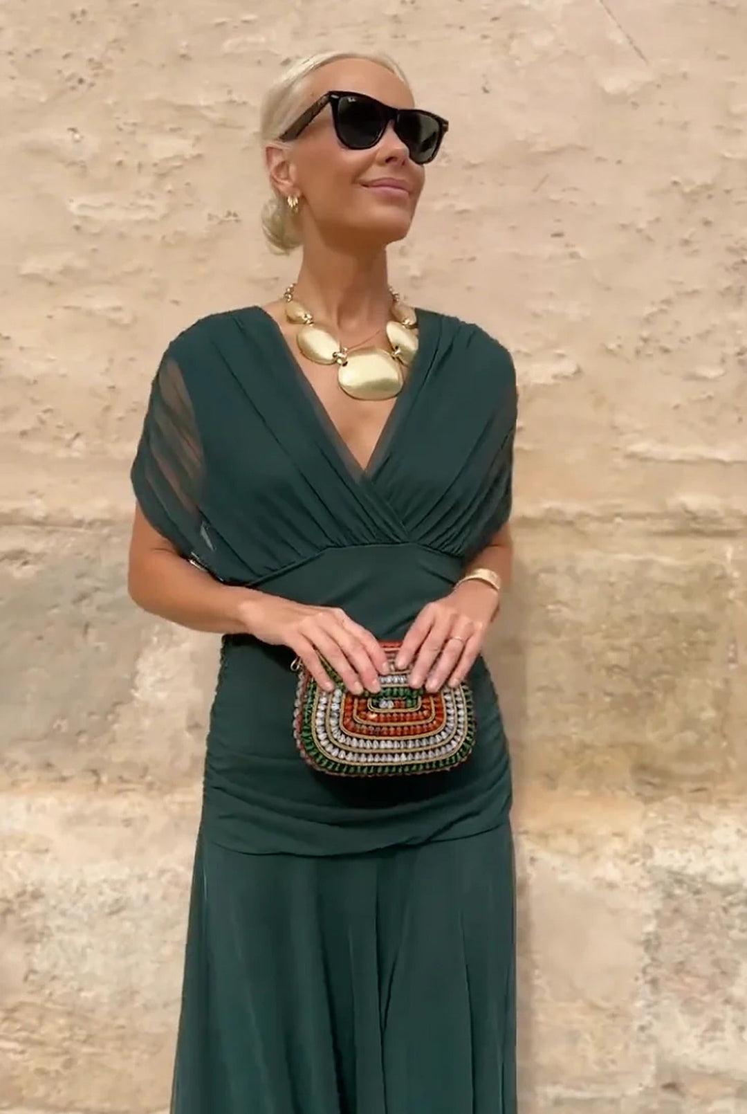 Luxurious women's V-neck wrap maxi dress with a flowing silhouette, perfect for sophisticated style.