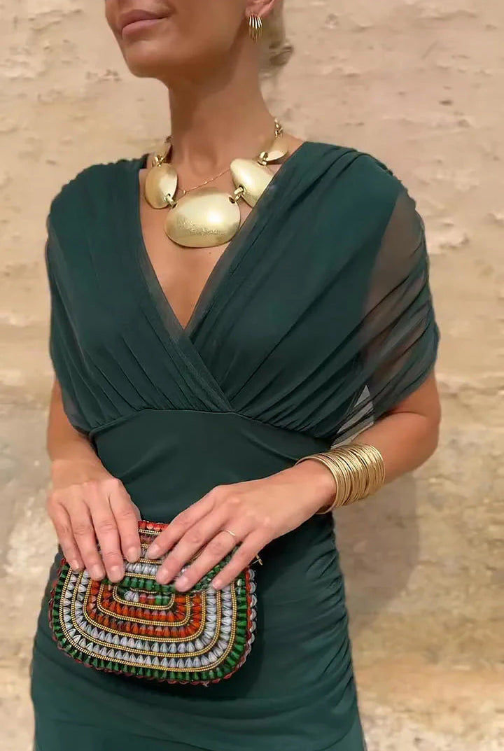 Maxi wrap dress for women, featuring an elegant V-neck and a beautiful flowing silhouette.