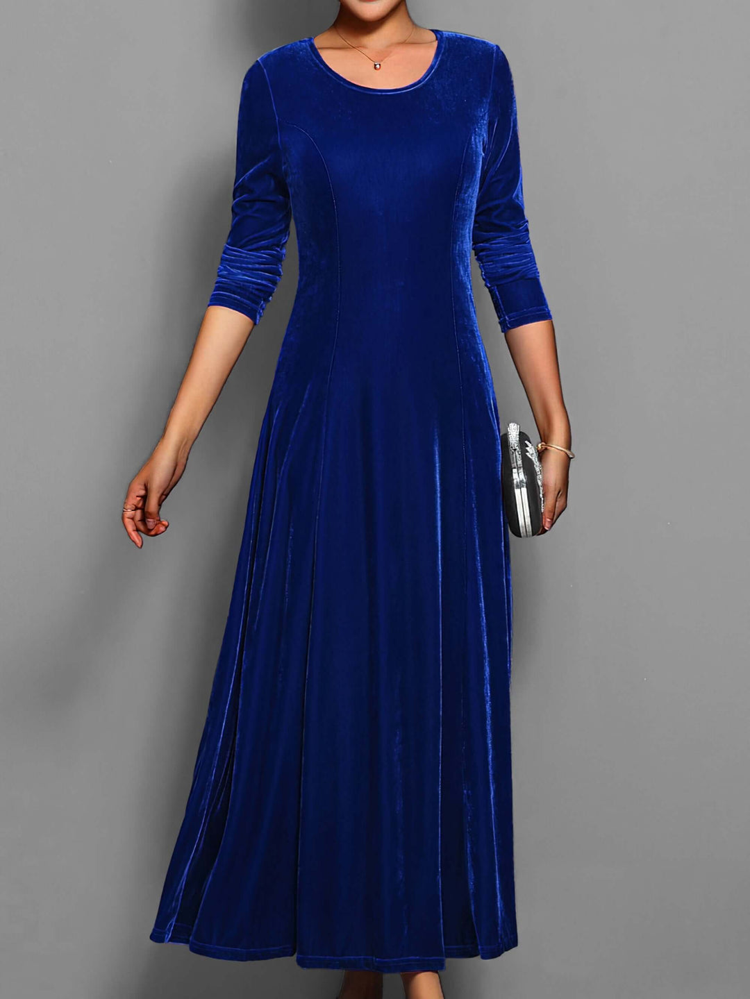 Luxurious velvet midi dress for women. Elegant long-sleeve design, ideal for evening wear, autumn & winter fashion.