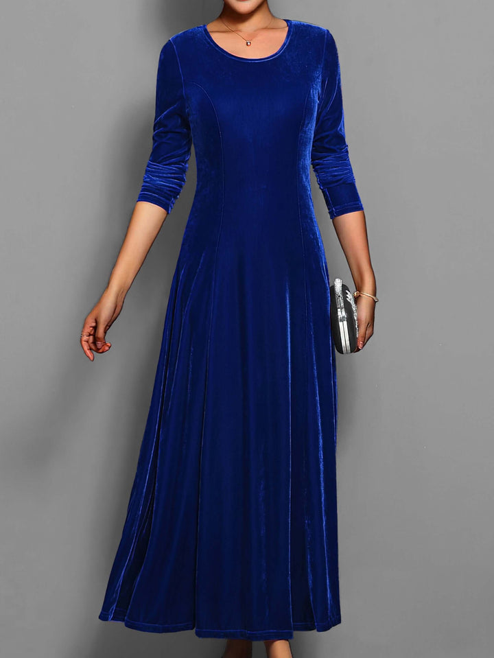 Luxurious velvet midi dress for women. Elegant long-sleeve design, ideal for evening wear, autumn & winter fashion.