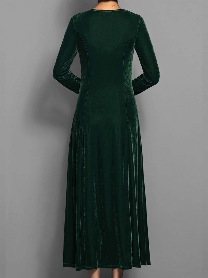 Elegant women's velvet midi dress. Long sleeve, crew neck, perfect for special occasions & party wear.