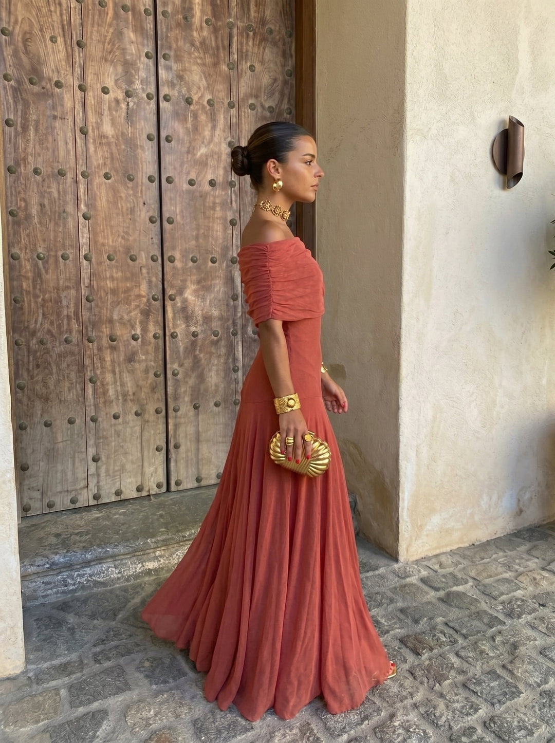 Flowing pleated maxi dress for women, off-shoulder Victoria style, elegant & comfortable party wear.