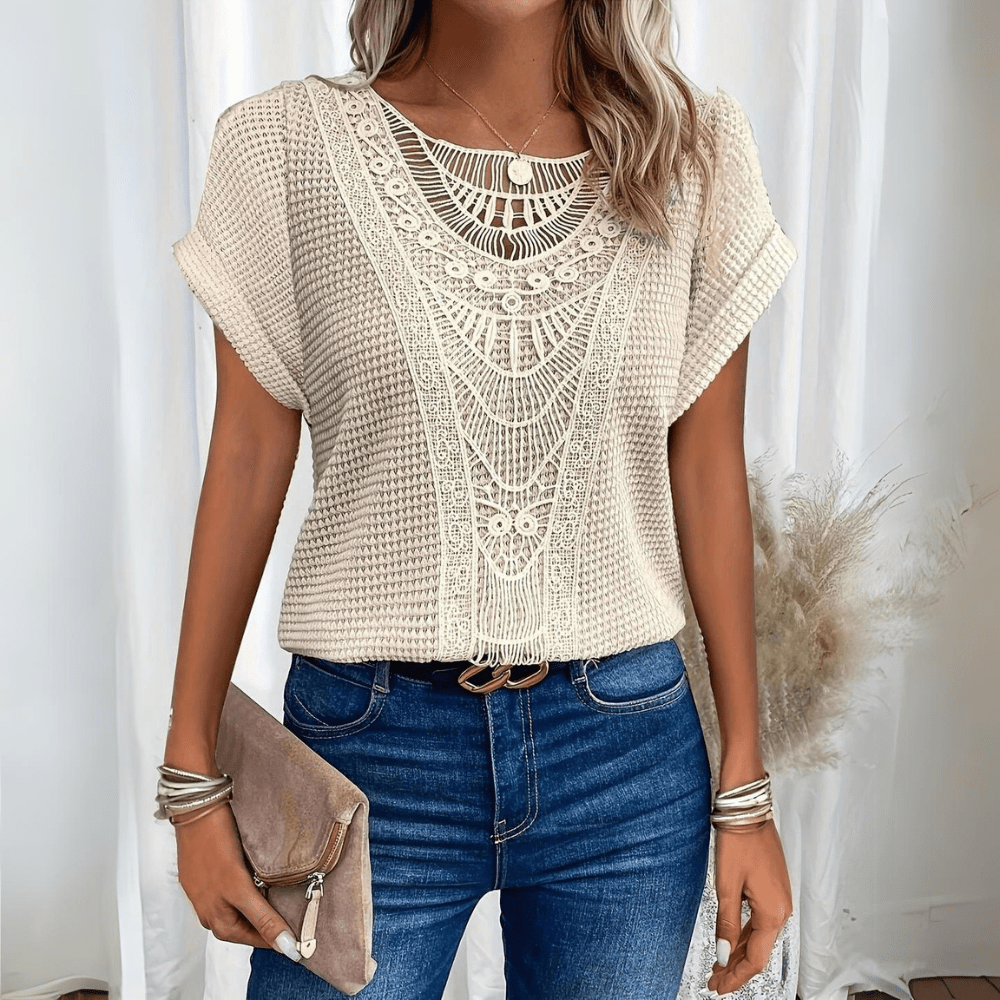 Elegant women's vintage lace accent top, perfect for summer fashion. Chic and versatile blouse.