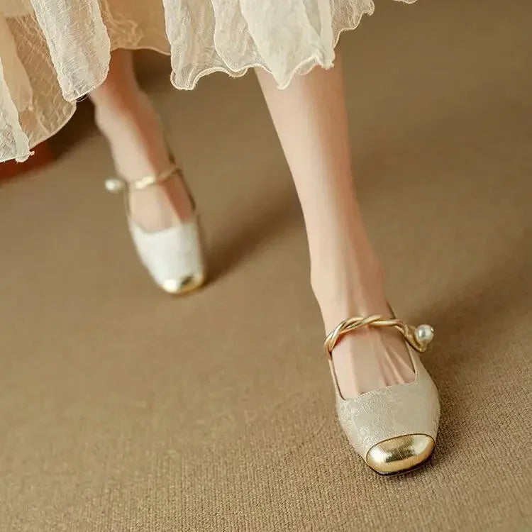 Sophisticated women's pearl strap Mary Jane shoes, offering both vintage style and comfort.