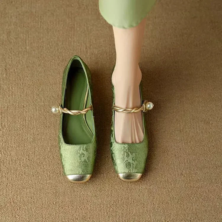 Stylish women's vintage Mary Jane shoes, featuring a unique pearl embellished strap.