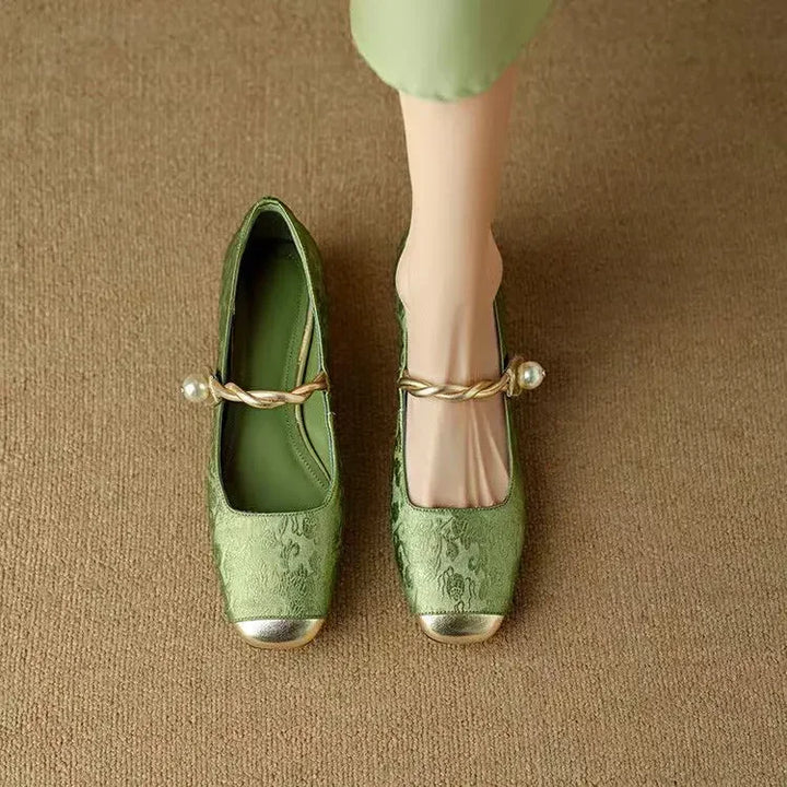 Stylish women's vintage Mary Jane shoes, featuring a unique pearl embellished strap.