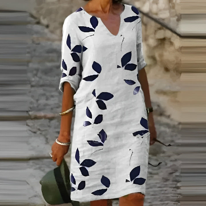 Flattering women's vintage v-neck short-sleeve midi dress, a classic elegant style for summer.