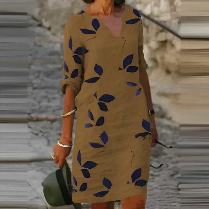 Classic vintage women's v-neck short-sleeve midi dress, versatile & elegant for summer or casual wear.