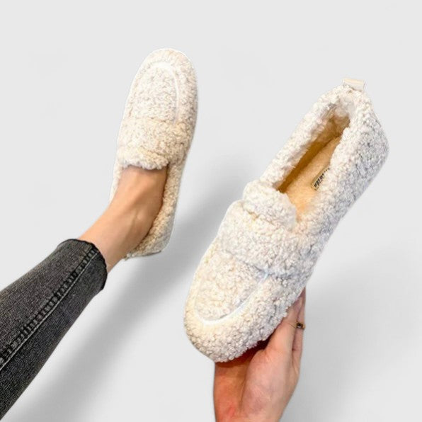 Cozy women's winter slippers, warm and non-slip for safe indoor comfort. Elegant loafer style home shoes.