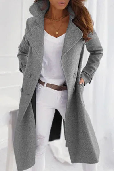 Warm & elegant women's winter coat, featuring a classic structured design. Sophisticated long outerwear.