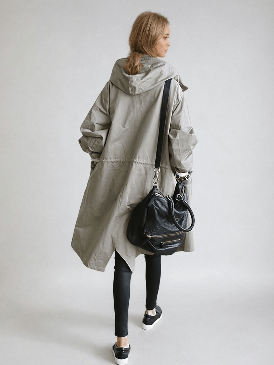 Lightweight women's trench coat, a classic water-repellent jacket for spring and autumn outerwear.