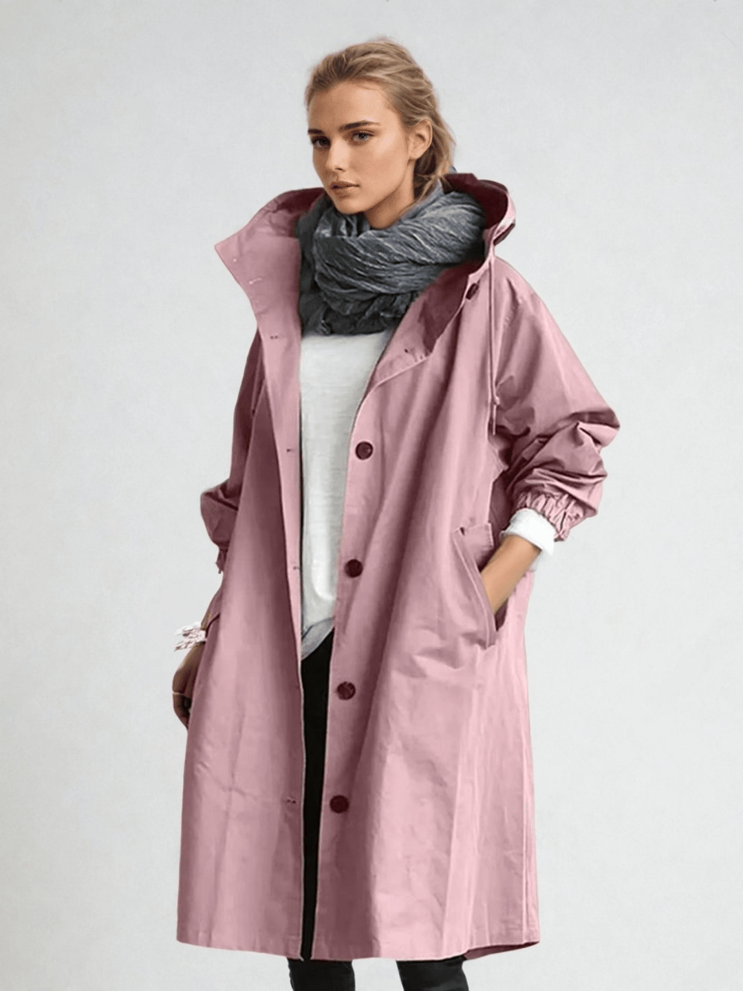 Stylish women's water-repellent trench coat, showcasing its elegant design and suitability as a long spring coat.