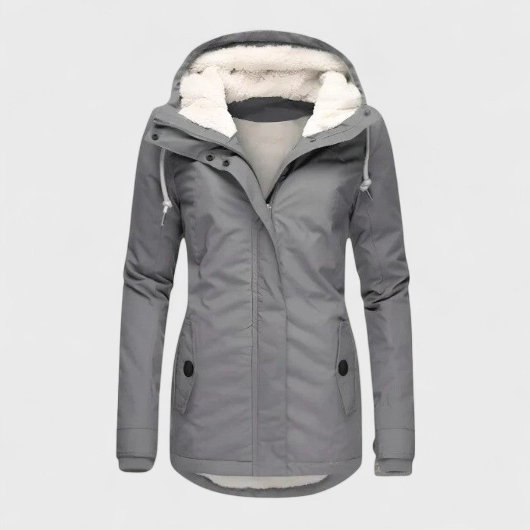 Elegant women's waterproof hooded winter coat for ultimate warmth & weather protection. Perfect for cold weather.