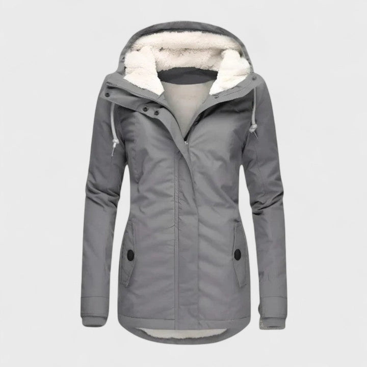 Elegant women's waterproof hooded winter coat for ultimate warmth & weather protection. Perfect for cold weather.