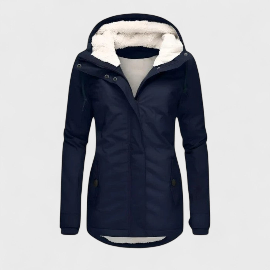 Cozy women's waterproof winter jacket with a hood, offering excellent weather protection & warmth for cold days.