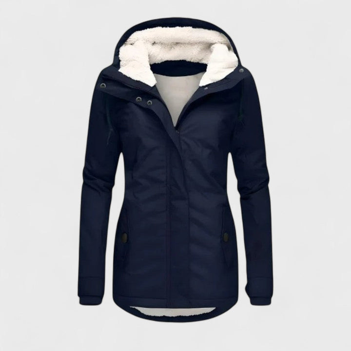 Cozy women's waterproof winter jacket with a hood, offering excellent weather protection & warmth for cold days.