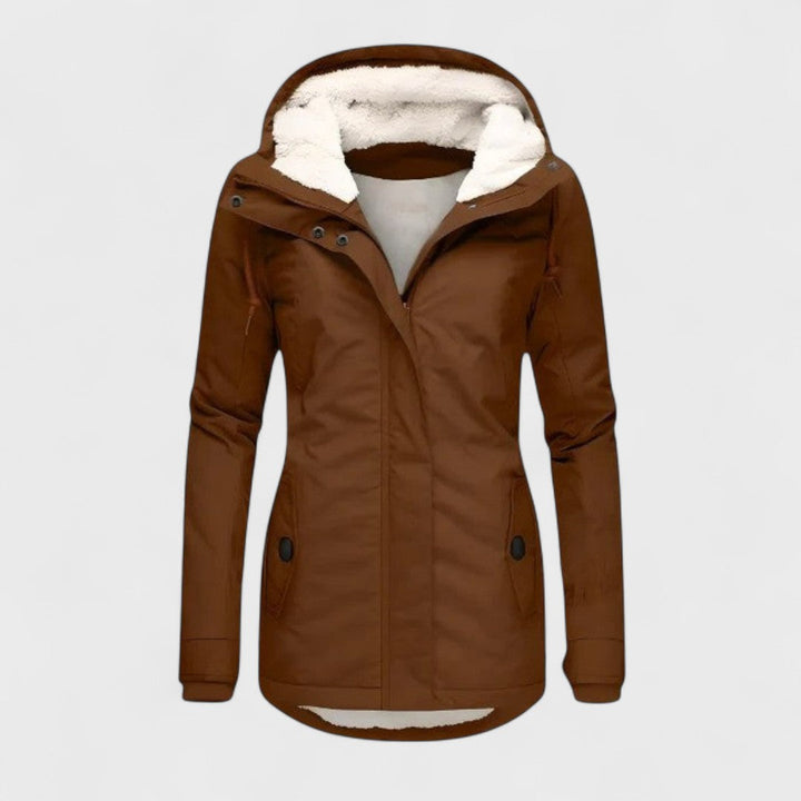 Durable waterproof women's winter coat with a warm hood. Essential long outerwear for cold, wet weather protection.