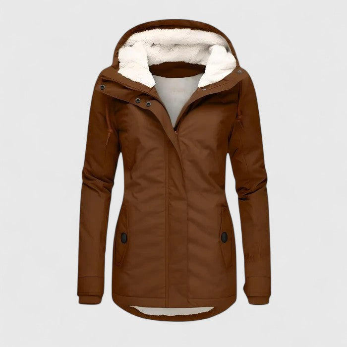Sophisticated women's jacket for rain, combining elegant fashion with practical waterproof outerwear. All-weather style.