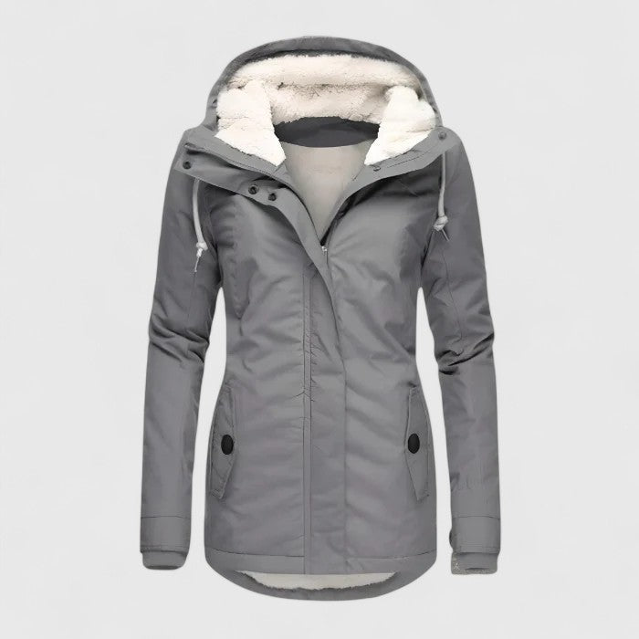 Modern women's waterproof jacket. Elegant, practical outerwear, offering sophisticated style and all-weather protection.